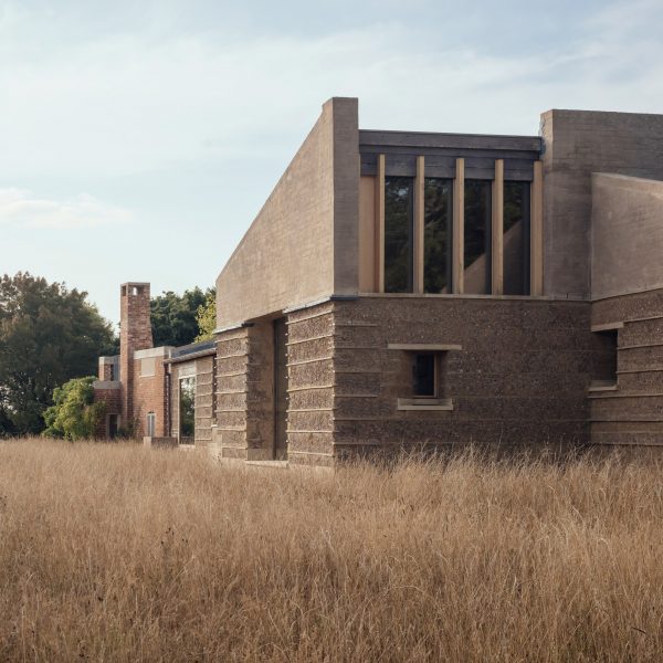 Exterior of Rammed Earth House by Tuckey Design