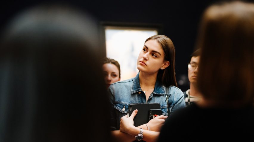 person standing in a gallery