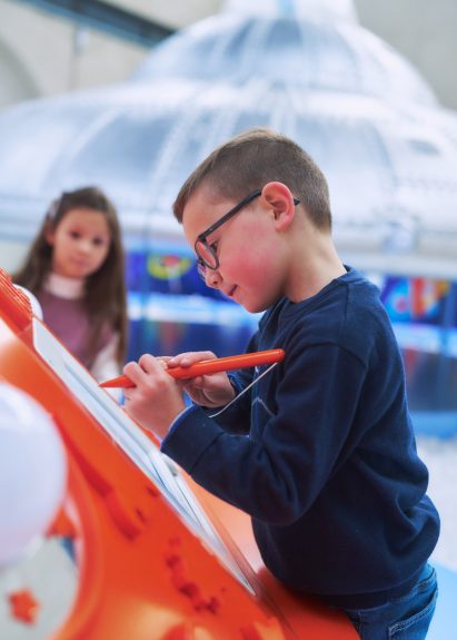 Children drawing at the playground