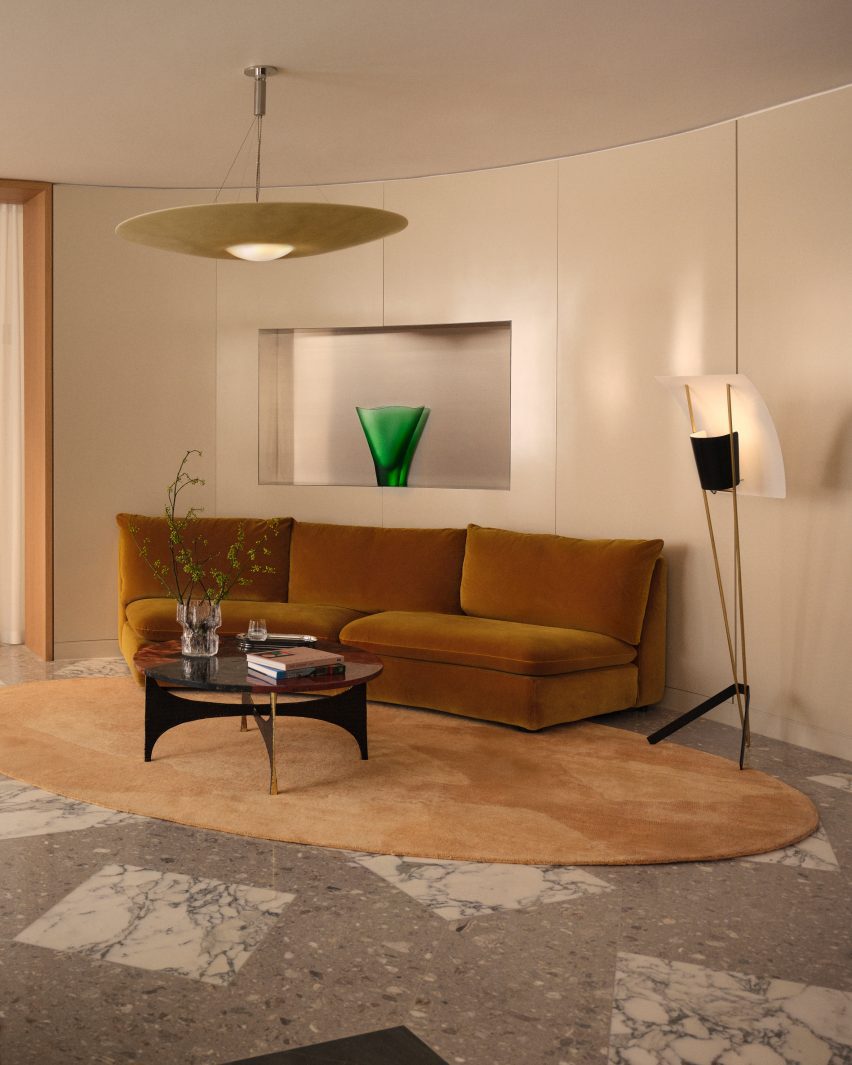 Brown sofa on stone floor