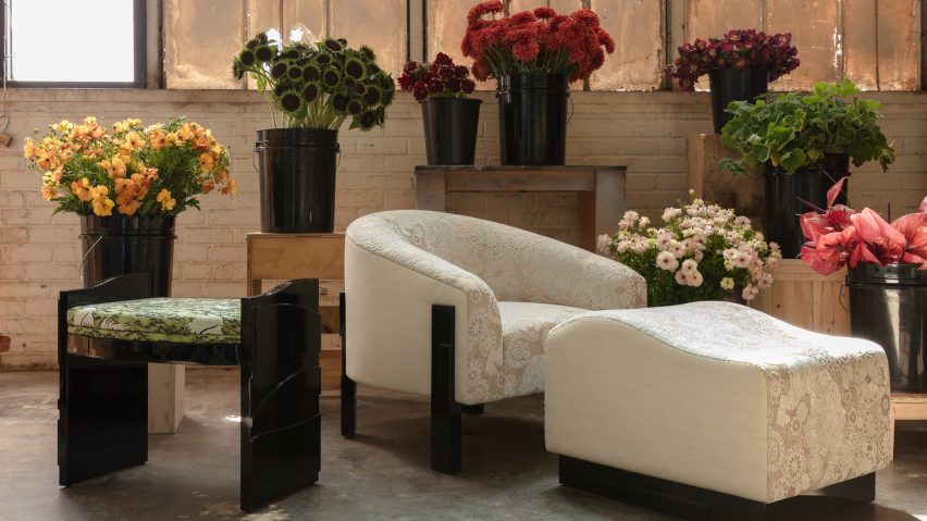 Flower display around petal-upholstered furniture pieces