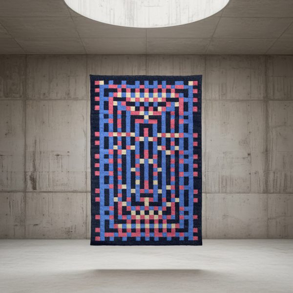 Display of rug made out of discarded yarn