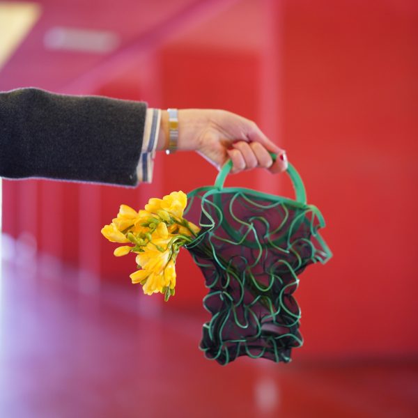 Hand holding 3D-printed bag