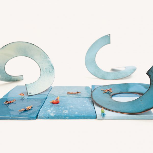 Model of people swimming over ceramic tiles