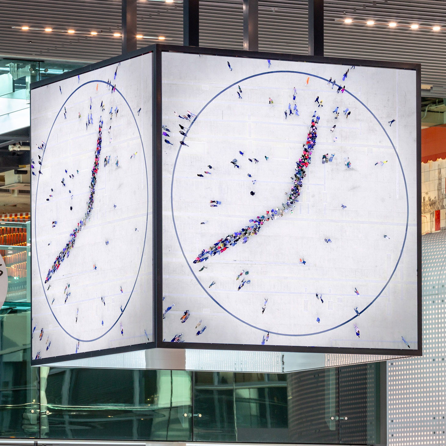 Clock with hands made of people