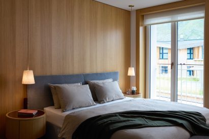 Bedroom of home in Switzerland with interiors by Patricia Urquiola