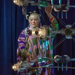Bethan Laura Wood with her Mille Fleurs chandelier