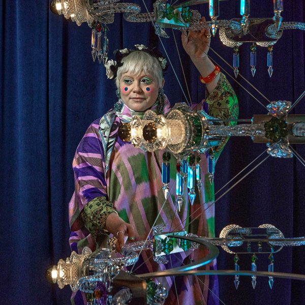 Bethan Laura Wood with her Mille Fleurs chandelier