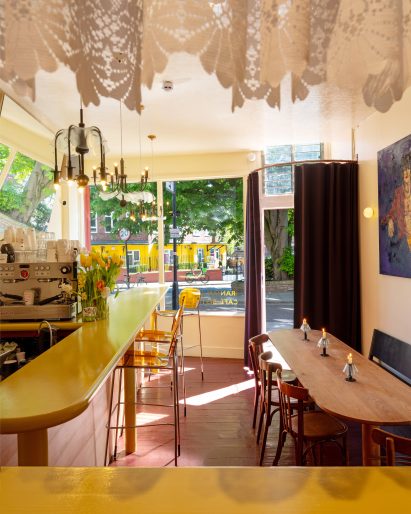 Lace curtains above the kitchen