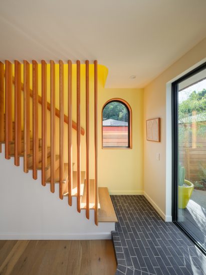 Yellow slated staircase in Los Angeles ADU