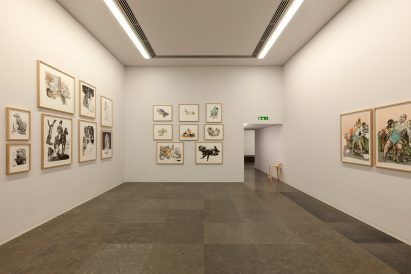 Exhibition room displaying Paula Rego artworks arranged across white gallery walls