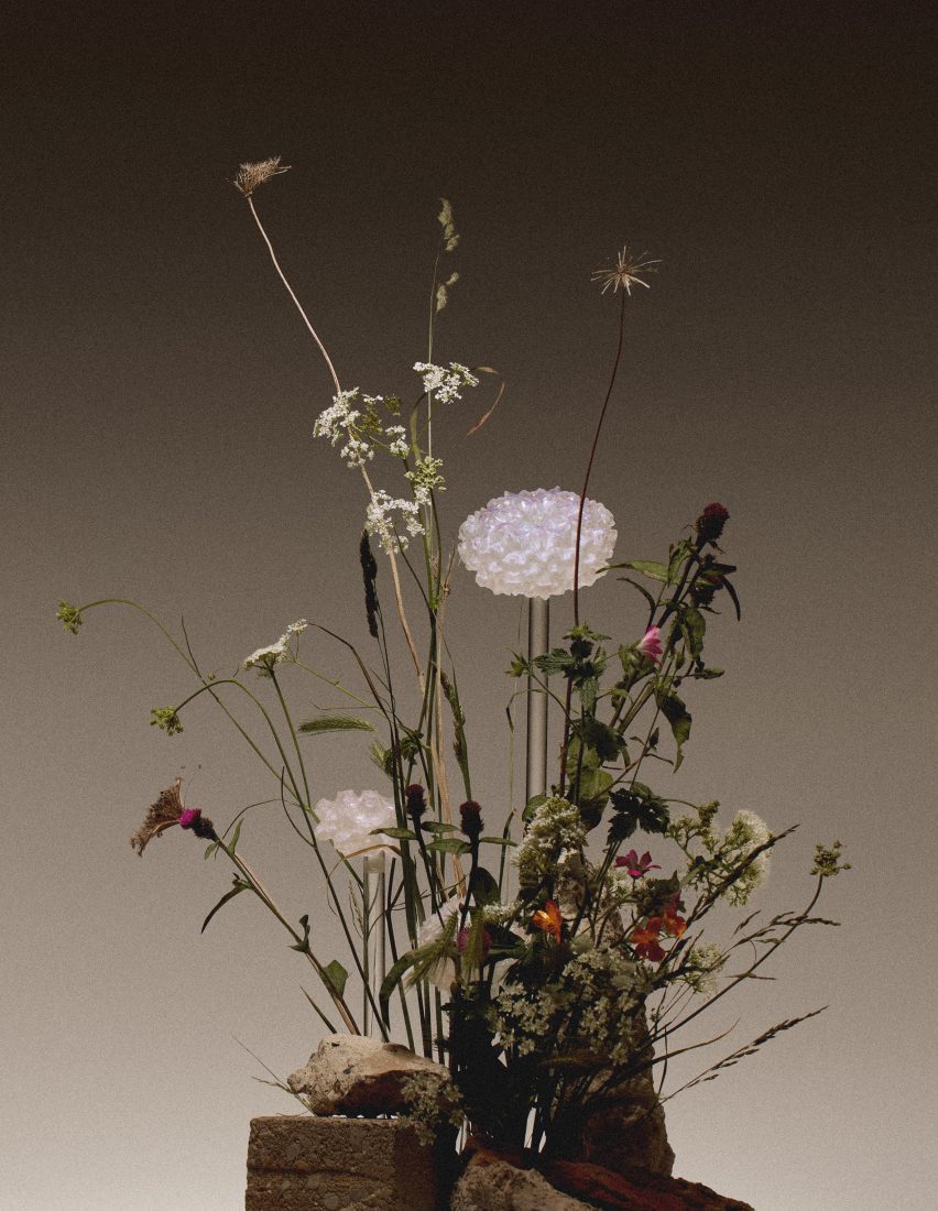Photo of a Faux Flora rein prototype within a bouquet of wildflowers