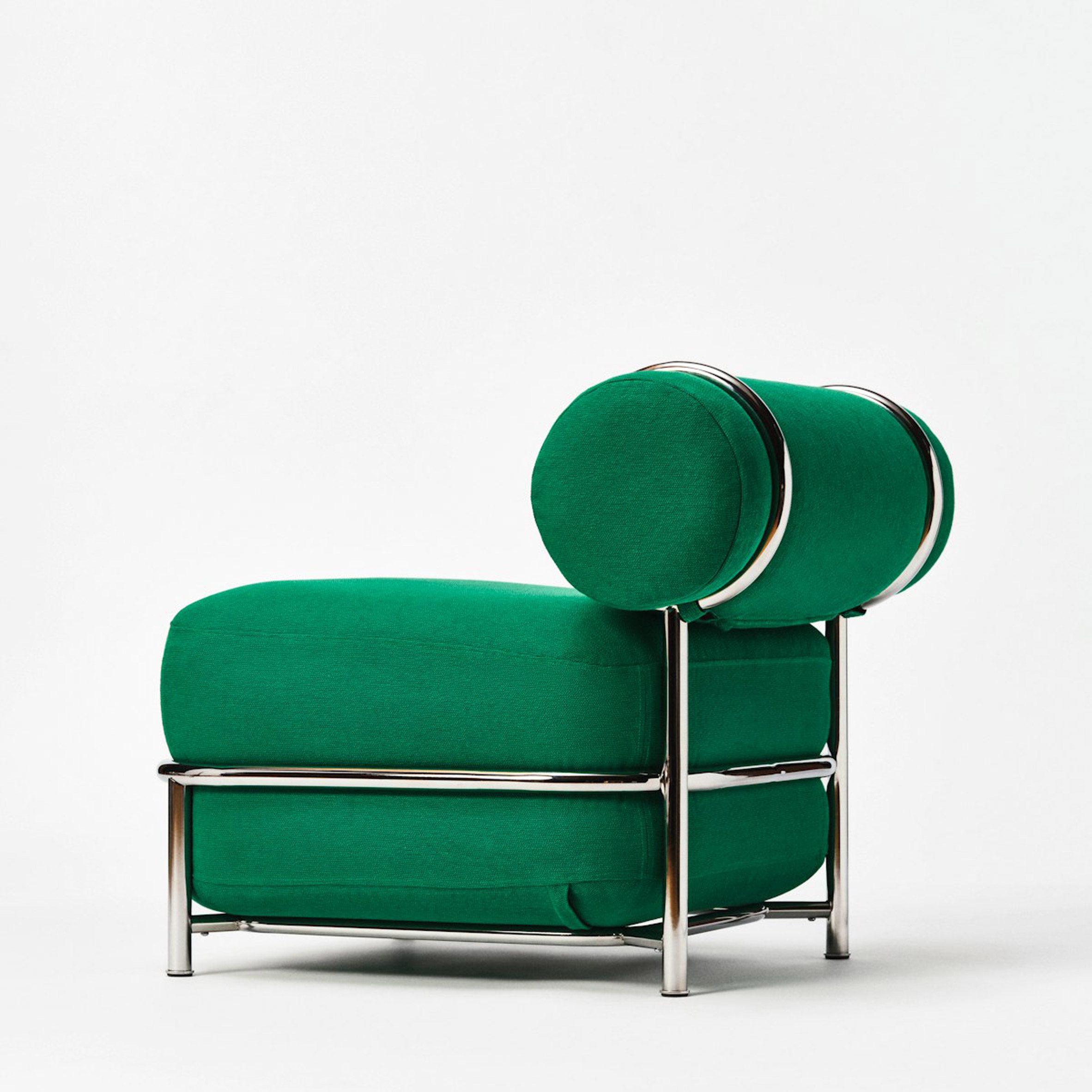 Green chair with tubular steel frame