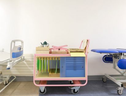 Pastel-pink tubular metal frame