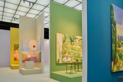 Wide shot of multiple displays at the Kartell stand at Salone del Mobile