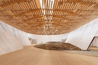 Hall with wooden floor and ceiling