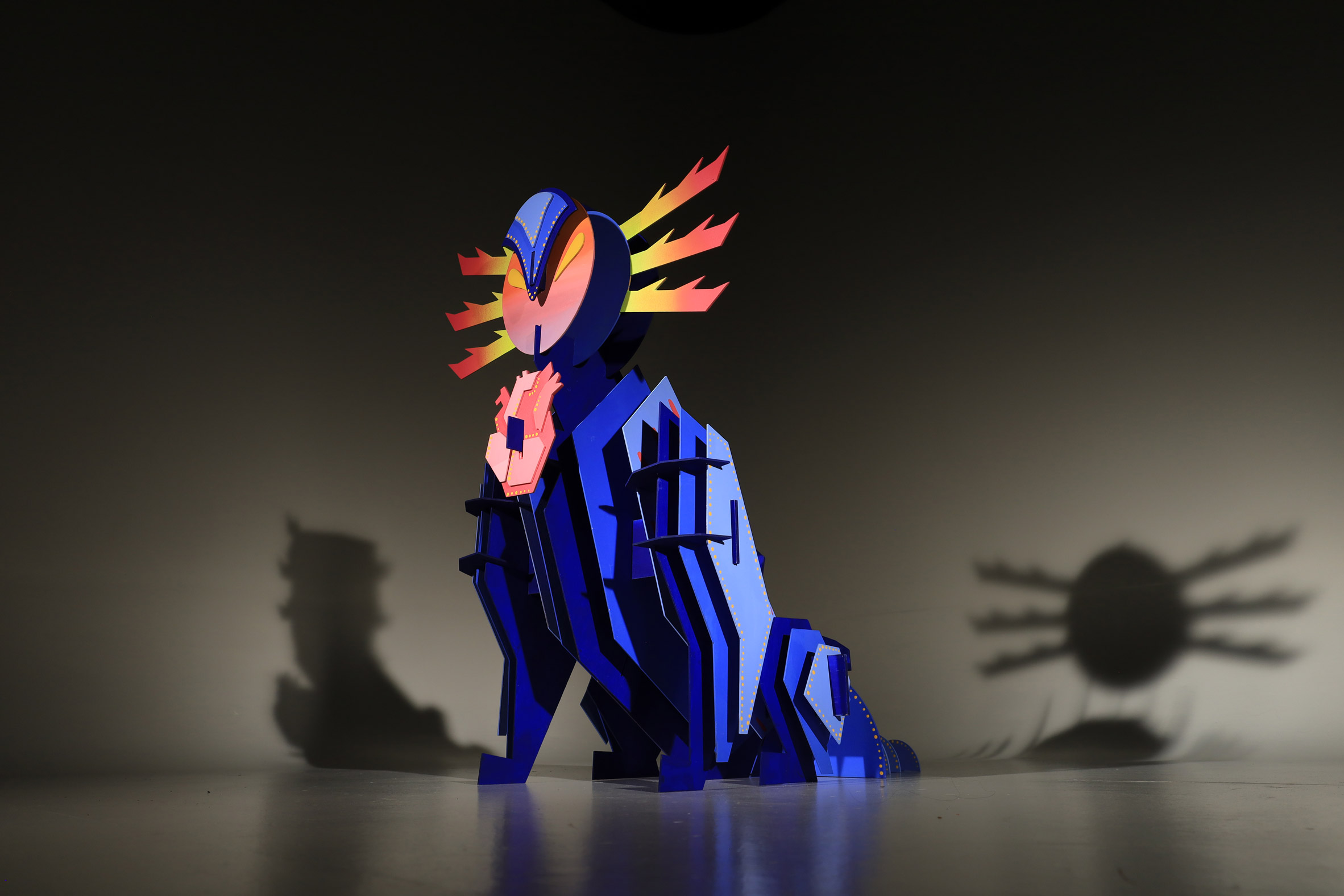 a model of a creature in tones of blue and orange
