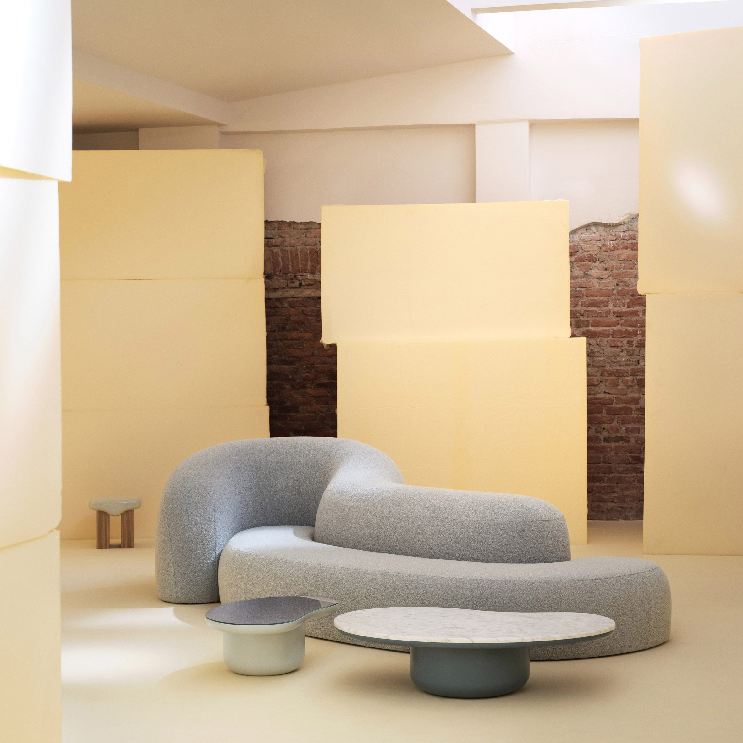 Sofa in front of yellow blocks