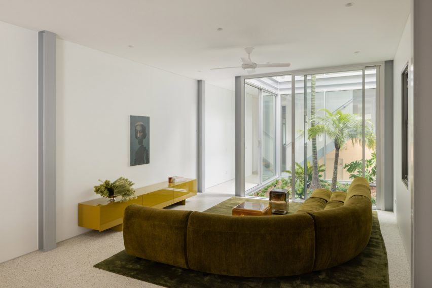 Living room with green sofa