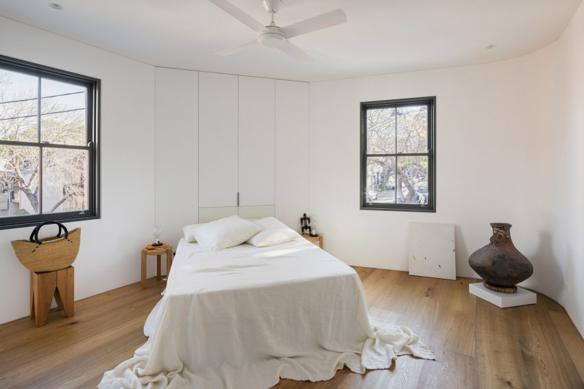 Corner bedroom with small Victorian windows