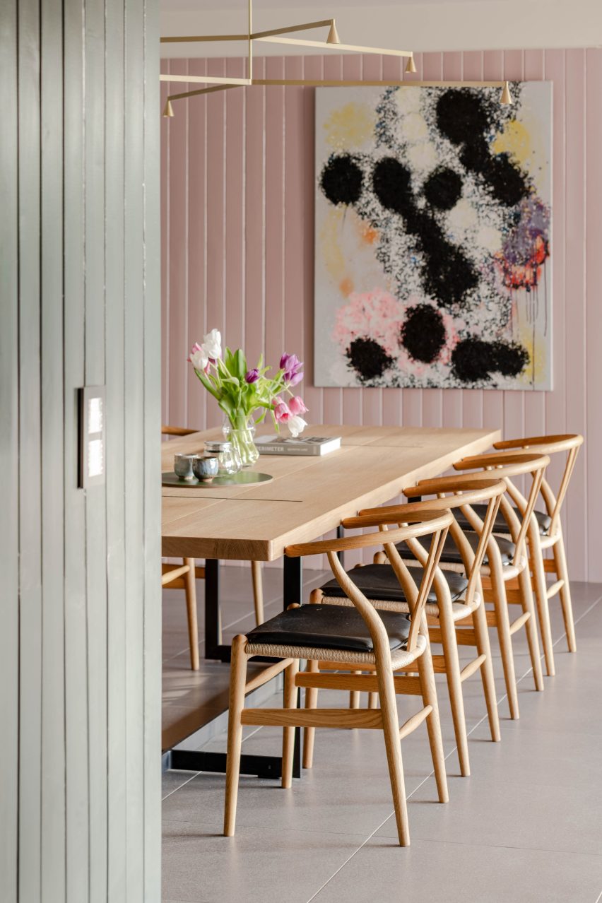 Pink and green dining area in Gresford Architects extension