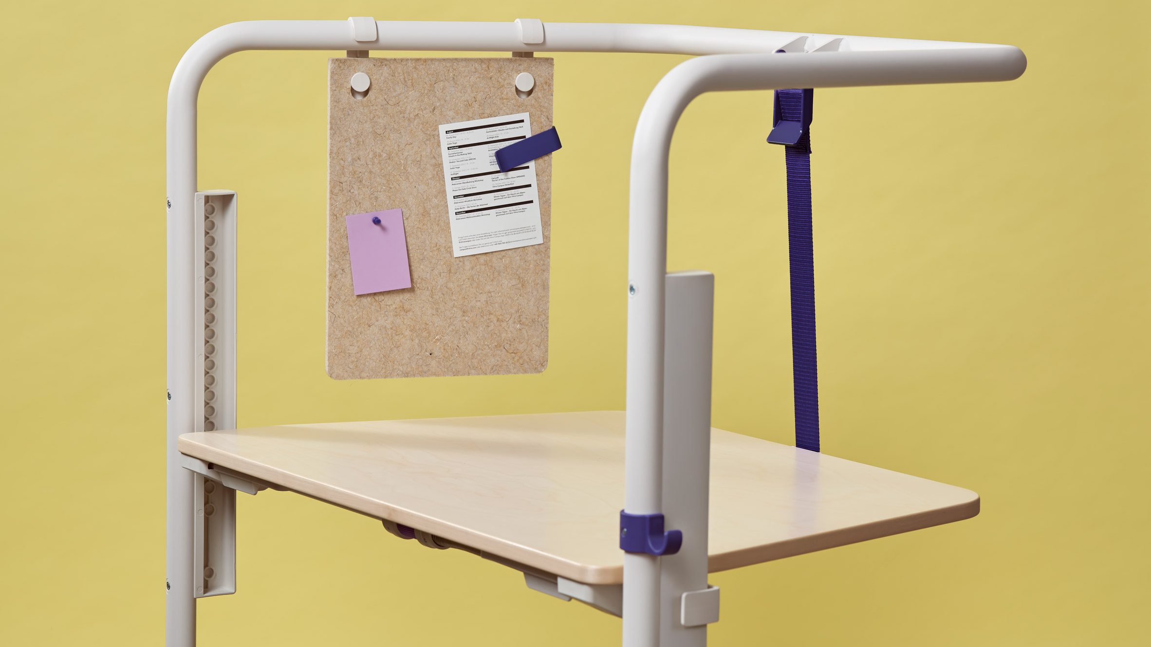 A work table on a colourful backdrop