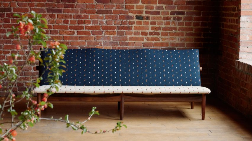 an image of a sofa in tones of blue and white