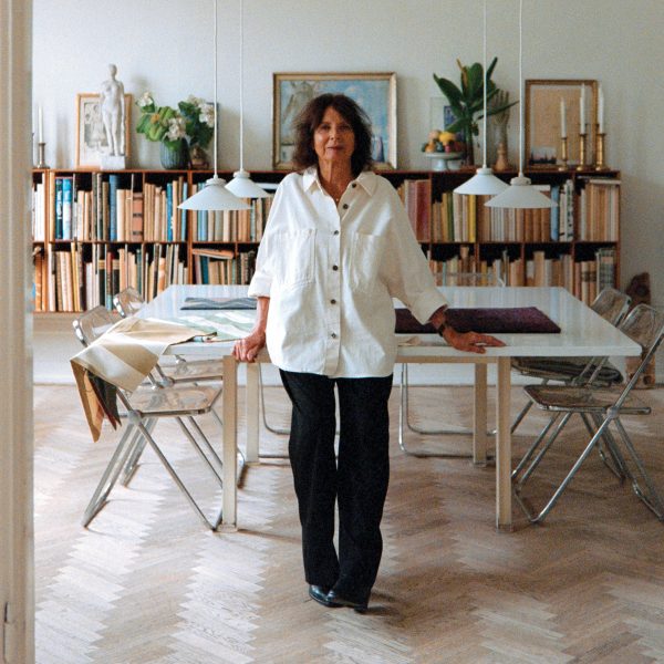 Kim Naver in front of exhibition space