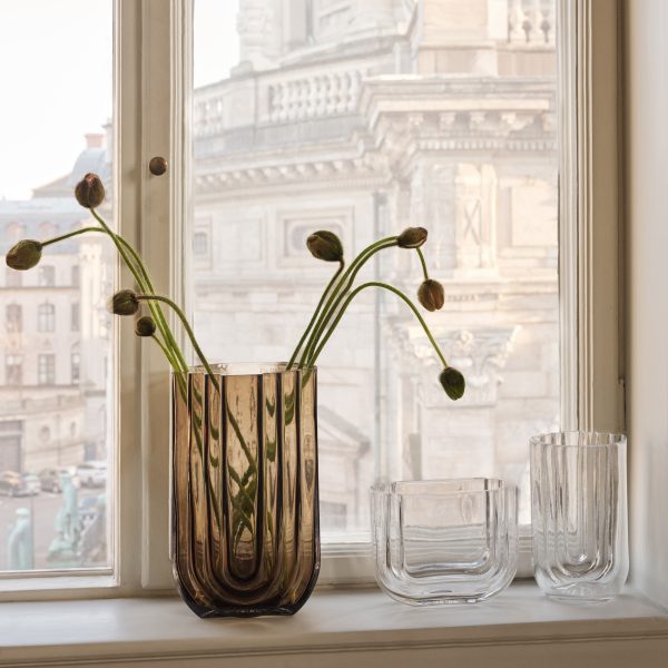 Vase display on window sill