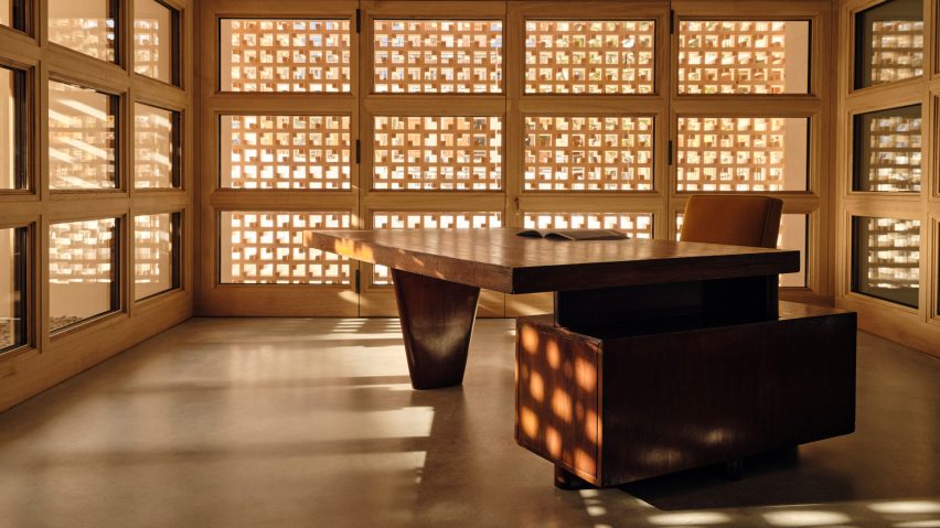 Room with gridded wooden screen