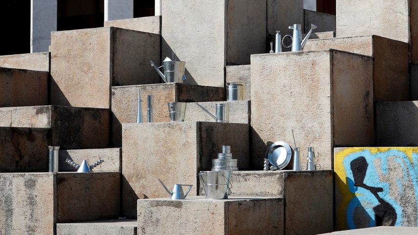 Display of metal craft objects on concrete blocks