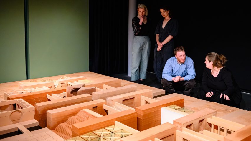 Photo of people looking at an architectural structure