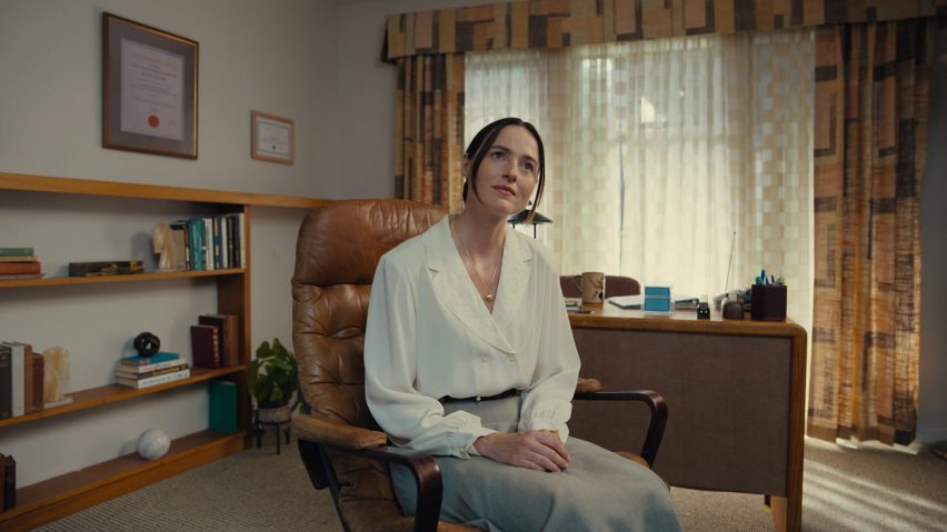 Photo from the film Backrooms showing Renate Reinsve as Dr Mary Kline sitting in her office