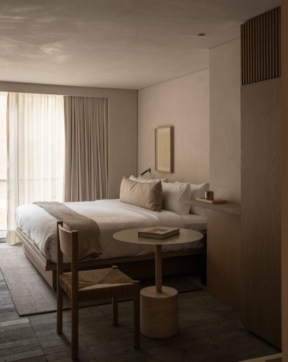 Hotel guest room with neutral-toned interior