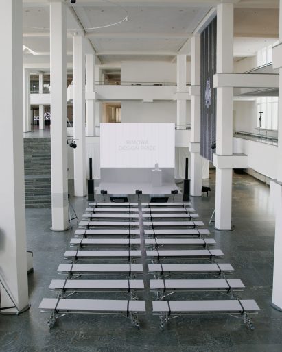 Wide view of the Rimowa Design Prize venue with rows of seating facing the stage