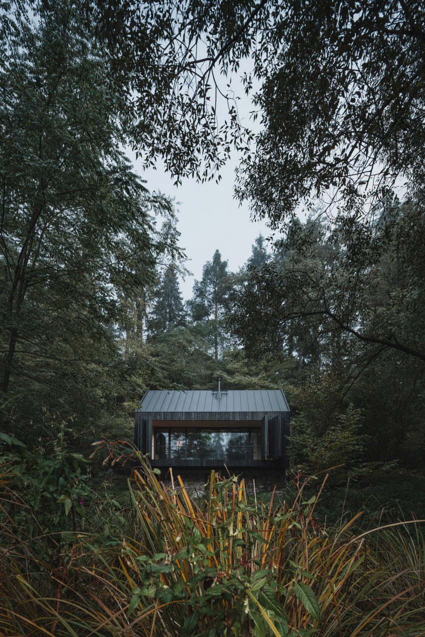 River, Rock, Fire by Mimosa Architects in Czech forest
