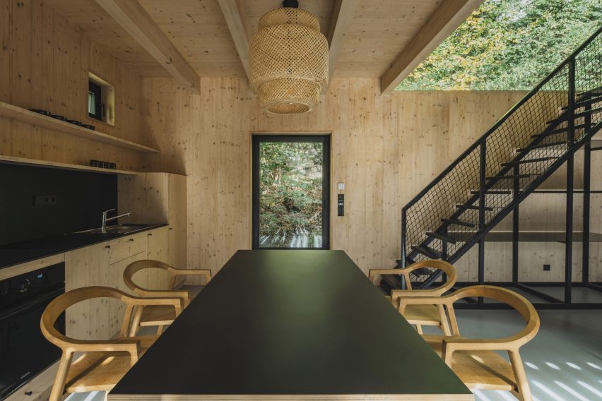 Spruce wood dining area in rural Czech cabin