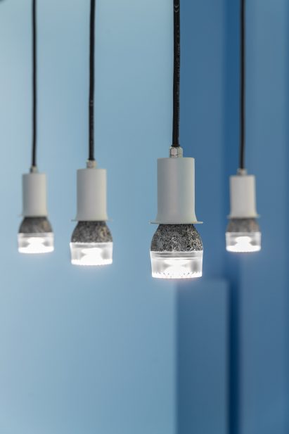Metal lightbulbs against pale-blue background