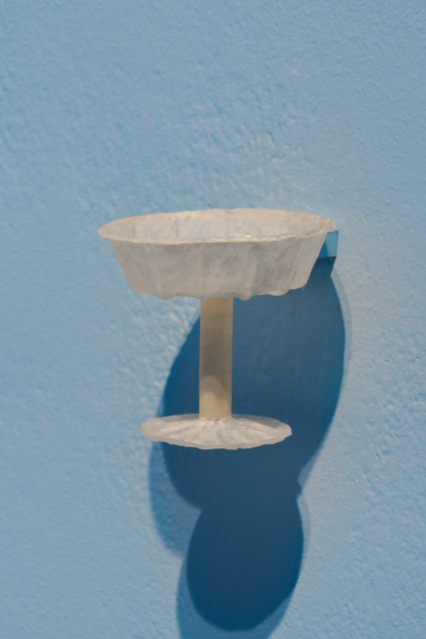 Paper cup on blue background