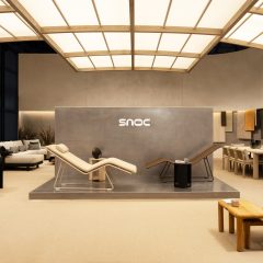 SNOC outdoor furniture within a glowing exhibition stand