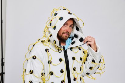 Speaker-covered coat