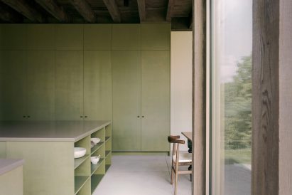Kitchen with green cabinets in a home in Quebec
