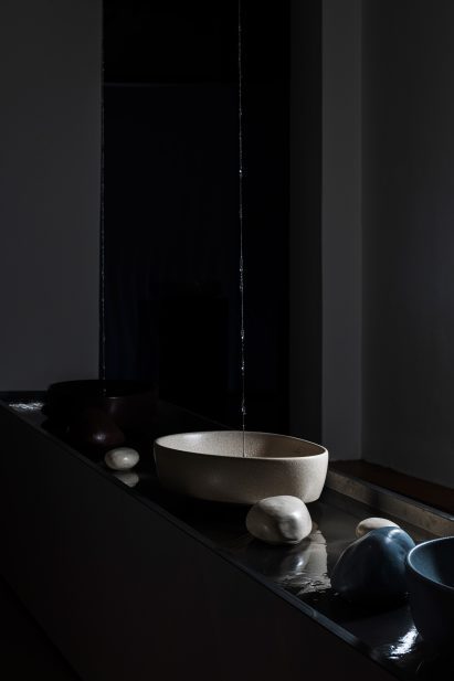 Water falling into ceramic basins by Villeroy & Boch and Ideal Standard