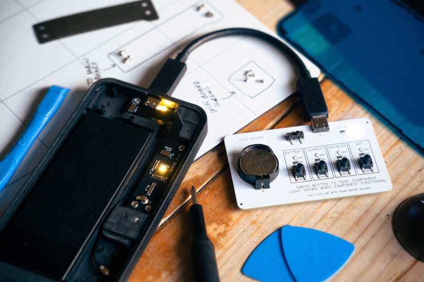 Close-up photo of the components within the Team Repair Repair Kit for Grown-Ups Mobile Phone Edition