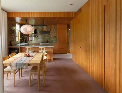Timber-clad kitchen in a home in Vancouver