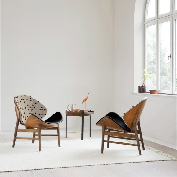 Photo of wooden chairs and side table by Warm Nordic
