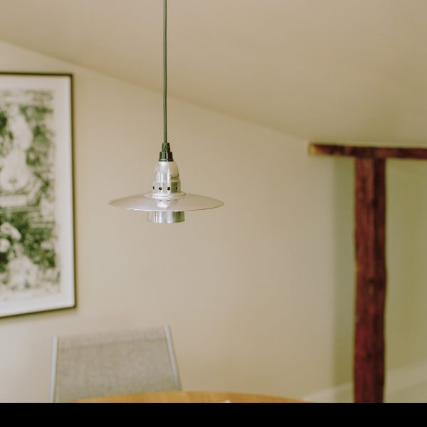 Photo of a light suspended in a room