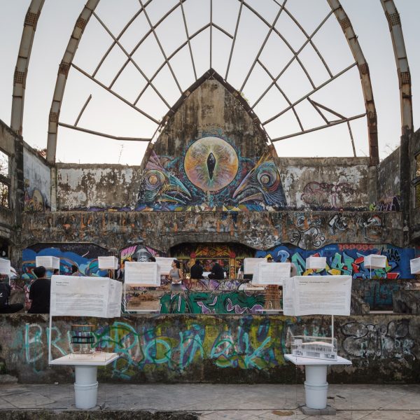 Photo of an exhibition in venue with graffiti