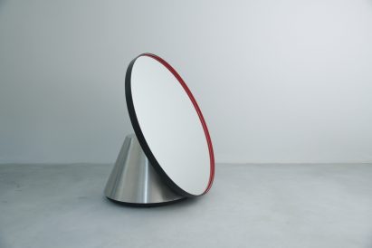 Image of a large sculptural mirror.