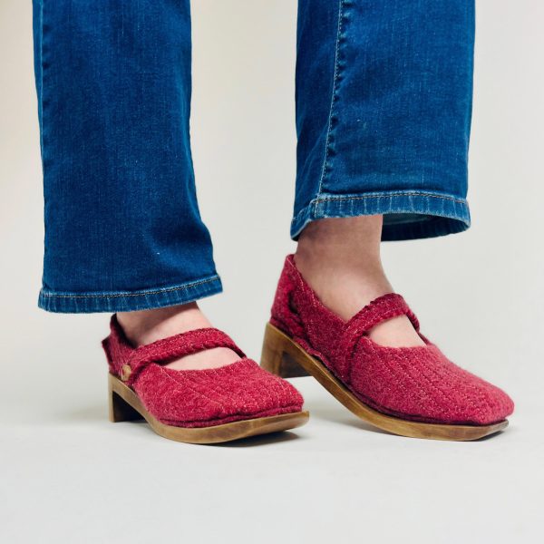image of a person wearing red shoes